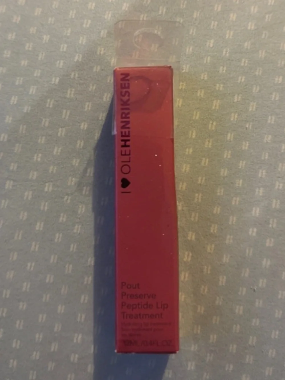 Ole Henriksen lingonberry jam glimmer pout preserve peptide lip treatment